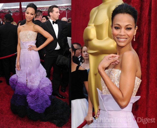 11. 佐伊•索尔达娜 (Zoe Saldana) 穿Givenchy紫色渐变礼服惊艳亮相2010年第82届奥斯卡金像奖(Annual Academy Awards)。这浓烈厚重的裙摆，某非它的设计灵感来自潘多拉星上的某种植物？你看，那上半身还在闪闪发光！<br>
<br>
 